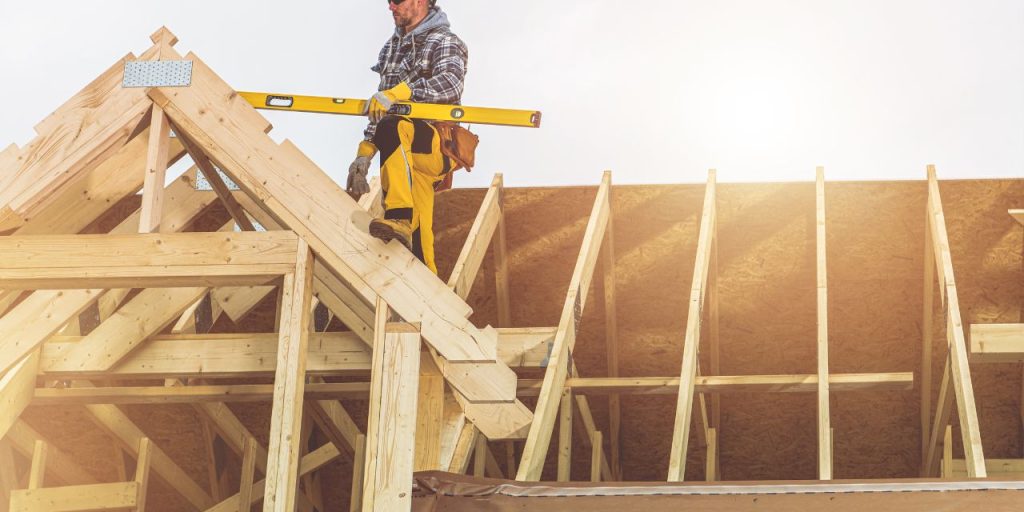 Carpenter at work on a new construction site.