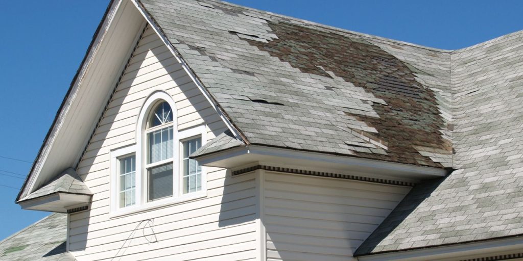 Weather-related roof damage. Missing shingles.