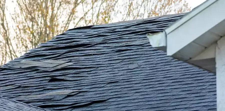 Asphalt roof storm damage