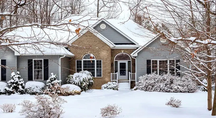 Home's roof covered in snow