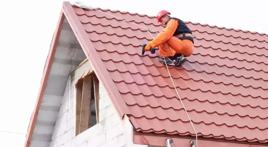 man repairing a roof