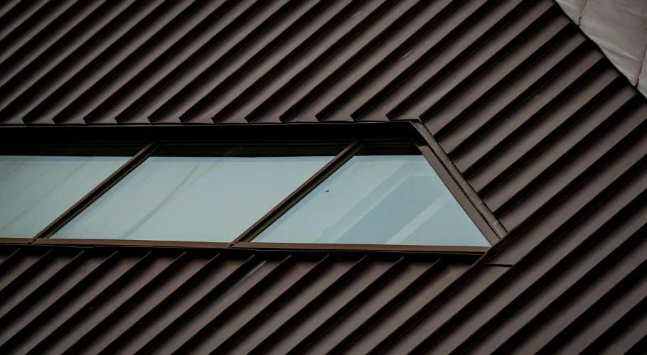 row of windows on metal roof