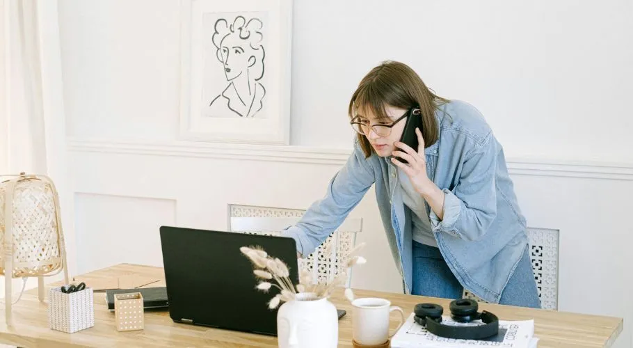 woman calling roofing contractors