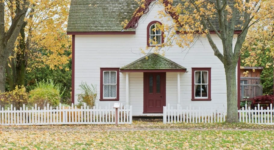 A white house made of wood.