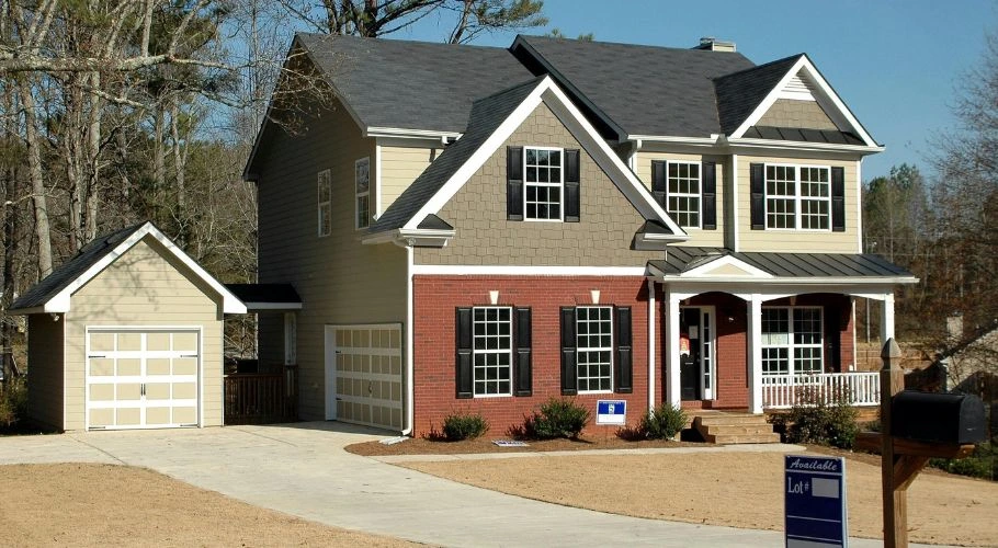 Gray, white, and red color palette on a house.