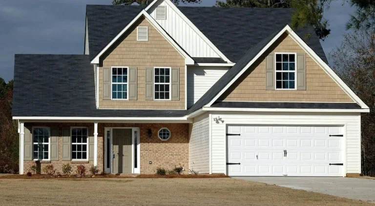 House with brown, white, and black exterior paint colors.