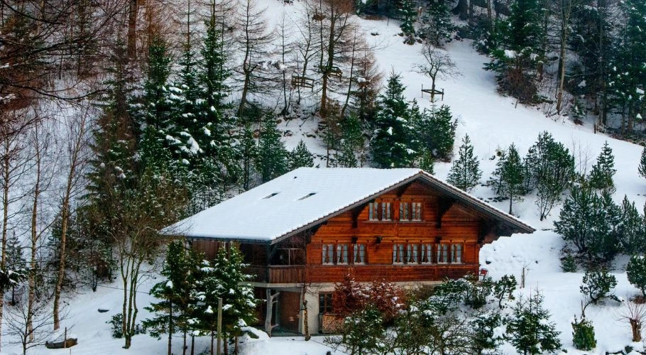 Wooden house in the snow.