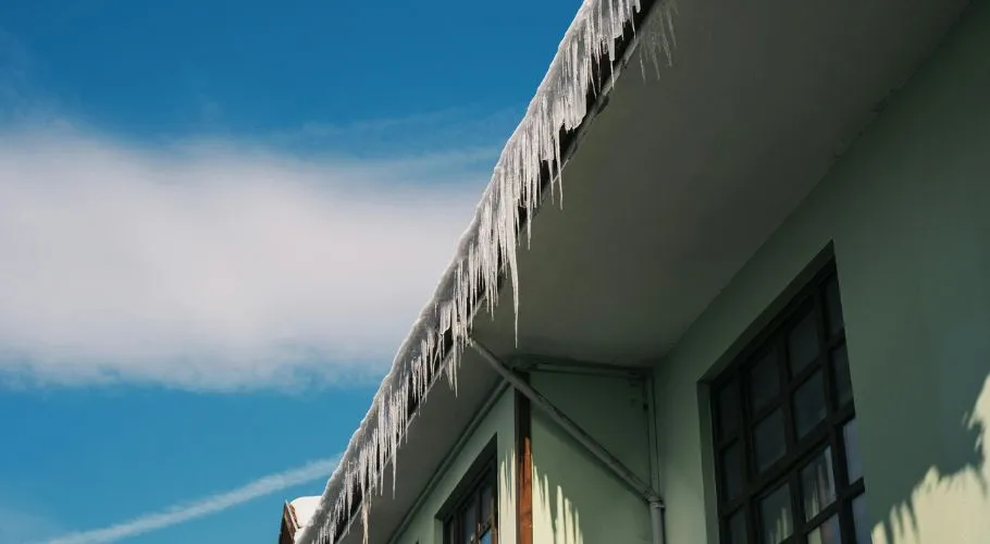 ice dams along the edge of a roof