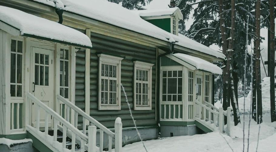 A house with a snow-covered roof.