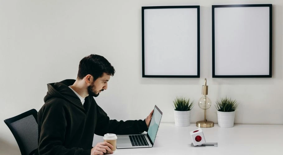 Man using his laptop.