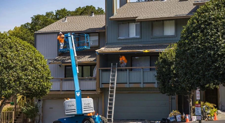 Team of roofers working on a project.