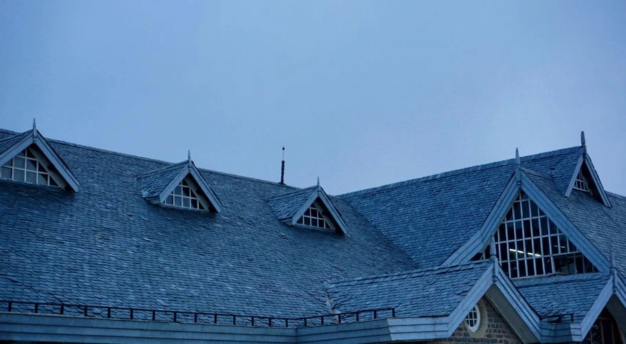 Close-up of an old home's roof.