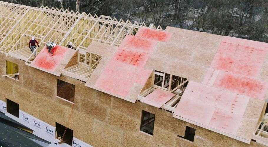professionals installing roof decking